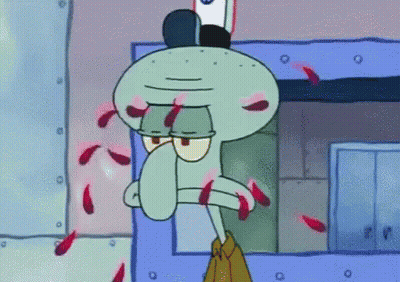 Squidward Behind Chain Link Fence GIF