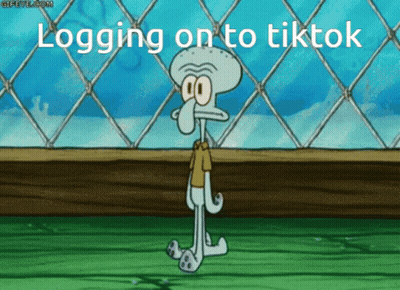 Squidward From Spongebob Is Standing In Front Of A Chain Link Fence With The Words Logging On To Tiktok GIF