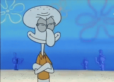 Squidward From Spongebob Squarepants Is Holding A Frisbee In His Hands . GIF
