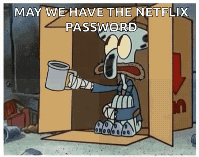 Squidward From Spongebob Squarepants Is Sitting In A Cardboard Box And Holding A Cup Of Coffee GIF
