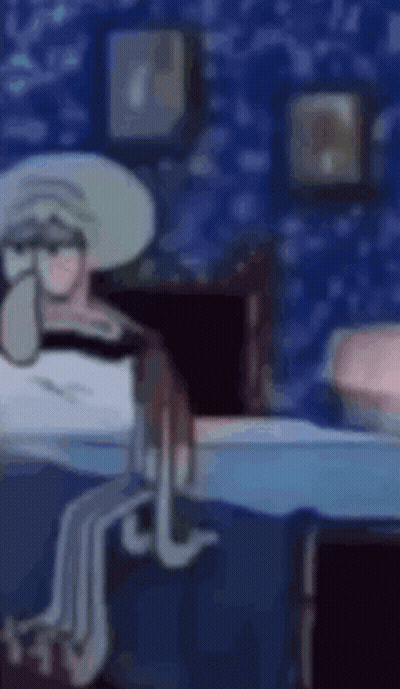 Squidward From Spongebob Squarepants Is Sitting On A Bed In A Room . GIF