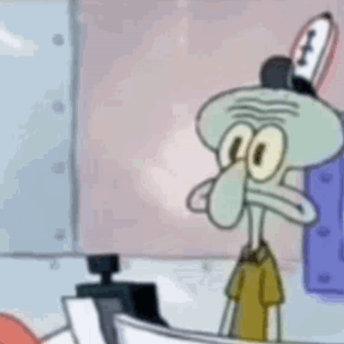 Squidward Holding Toothbrush In Mouth GIF