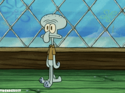 Squidward Standing In Front Of Fence GIF