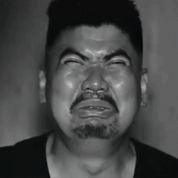 Squinting Eyes Funny Puckered Face GIF