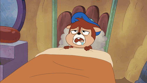 Squirrel Laying In Bed With Mouth Open GIF