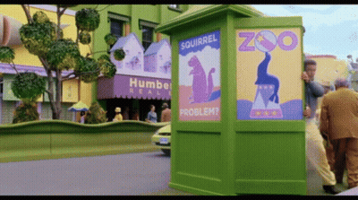 Squirrel Zoo Sign On Green Building GIF