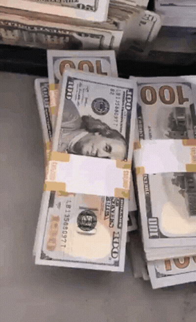 Stack Of 100 Dollar Bills With Benjamin Franklin GIF