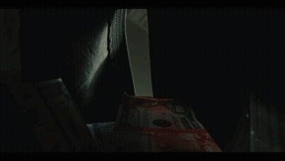 Stack Of 100 Dollar Bills With Bloody Face GIF