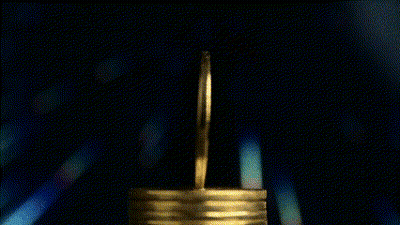 Stack Of Gold Coins With BTC Moneytalks Logo GIF