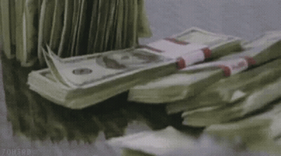 Stack Of Money On Pile GIF