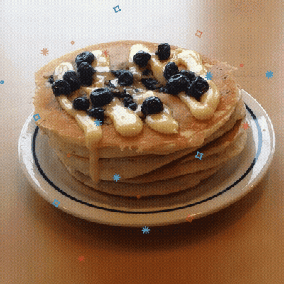 Stack Of Pancakes With Blueberries And Syrup GIF