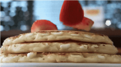 Stack Of Pancakes With Strawberries On Plate GIF