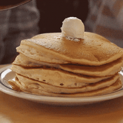 Stack Of Pancakes With Syrup And Butter GIF