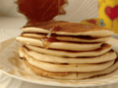 Stack Of Pancakes With Syrup Being Poured GIF