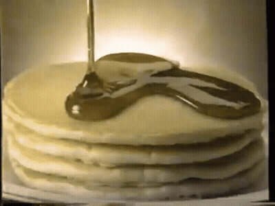 Stack Of Pancakes With Syrup Being Poured GIF