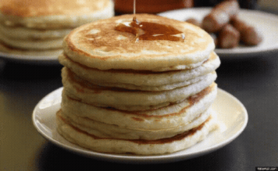 Stack Of Pancakes With Syrup Being Poured GIF