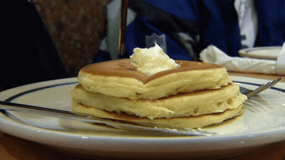 Stack Of Pancakes With Whipped Cream GIF