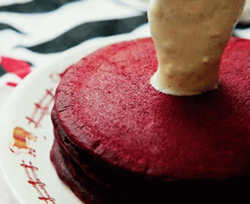 Stack Of Red Pancakes With Frosting GIF