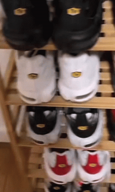 Stack Of Shoes On Shelf GIF