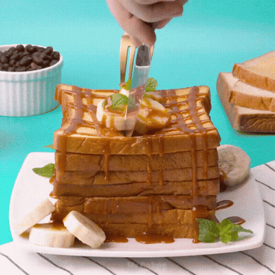 Stack Of Toast With Bananas And Caramel Sauce GIF