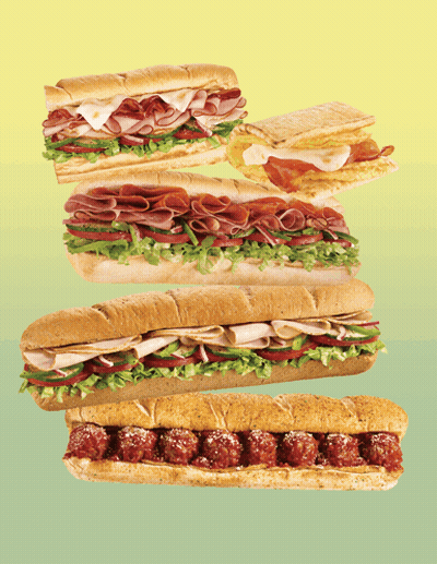 Stacked Sub Sandwiches on Green and Yellow