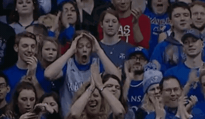 Stadium Crowd Watching Game, One Holding Head GIF