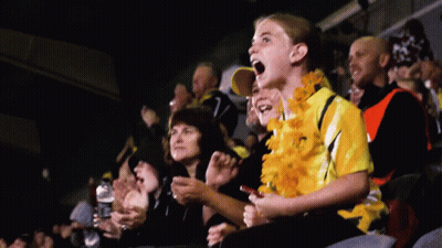 Stadium Group One Wearing Yellow Shirt Saying A GIF