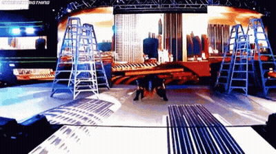 Stage With City Background Saying Big Thing GIF