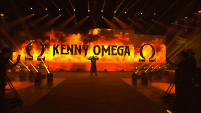 Stage With Large Screen Saying Kenny Omega GIF