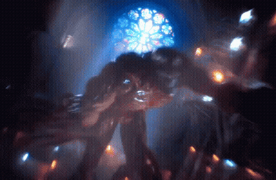 Stained Glass Window With Glowing Object GIF