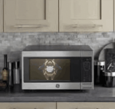 Stainless Steel Microwave On Kitchen Counter GIF