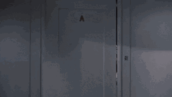 Stalking Behind Door Vintage Movie Clip GIF