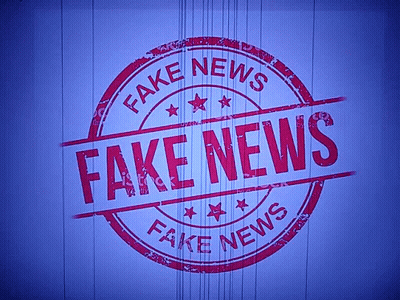 Stamp Saying Fake News In Red GIF