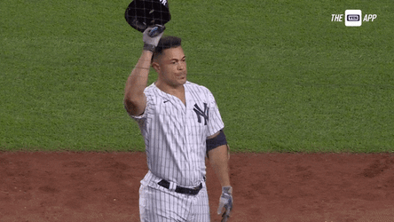 Stanton Raises Arm Showing Hat GIF