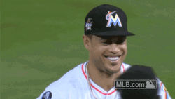 Stanton Smilling Passes Teammates GIF