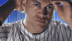 Stanton Wears Cap Poses GIF