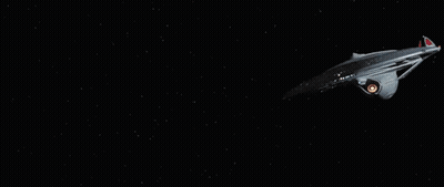 Star Trek Ship Flying With Large Orange Eye GIF