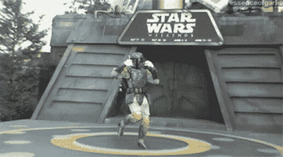 Star Wars Weekends Sign With Running Man In Costume GIF