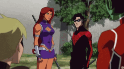 Starfire Pointing Robin GIF