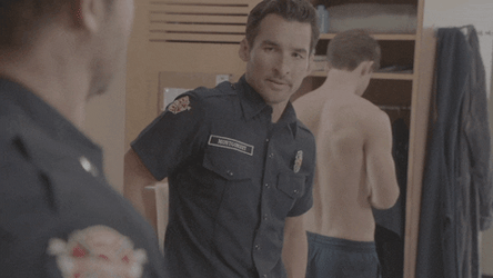 Station 19 Travis Montgomery Looking At Text Message GIF