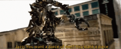 Statue In Front Of Building Saying Jazz You Want A Piece Of Me GIF