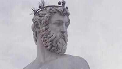 Statue Of Bearded Man With Crown GIF