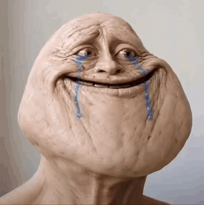 Statue Of Crying Face With Tears GIF