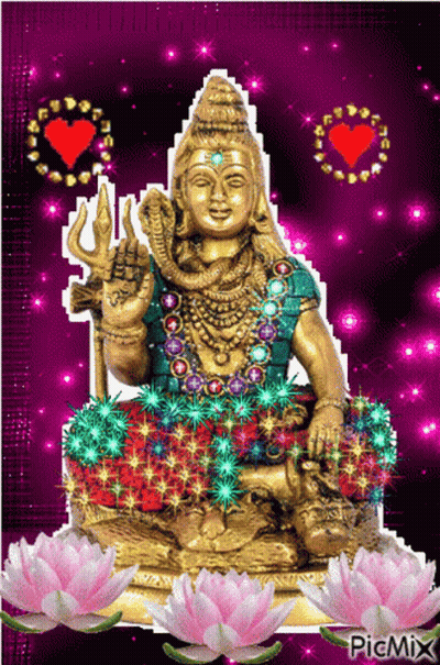 Statue Of Deity Surrounded By Pink Flowers GIF