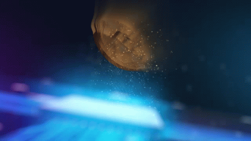 Statue Of Face Surrounded By Blue Light GIF