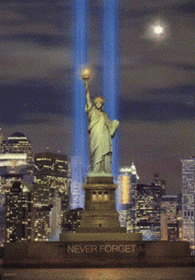 Statue Of Liberty Lit Up Saying Never Forget GIF