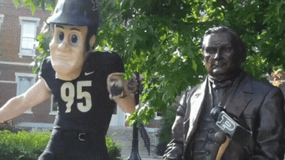 Statue Of Man In Number 95 Jersey GIF