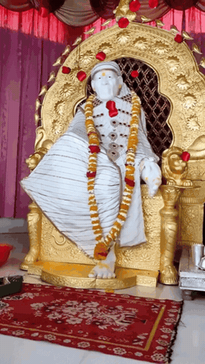 Statue Of Man On Gold Throne GIF