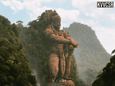 Statue Of Man On Mountain With Kvvcsr GIF