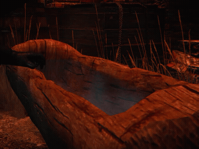 Statue Of Man Surrounded By Fire GIF